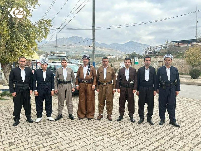 Members of traffic police in the Kurdistan Region's Akre posing for a group photo in Kurdish traditional clothes, March 9, 2023. (Photo: Salah Zebary)
