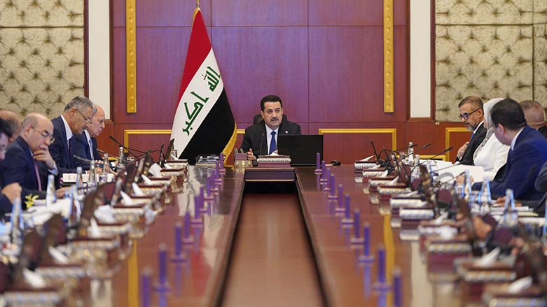 Iraq's Prime Minister Mohammed Shia al-Sudani heading a ministers meeting to vote on the federal budget in Baghdad on March 13, 2023. (Photo: Iraqi Prime Minister's Press Office/ AFP)