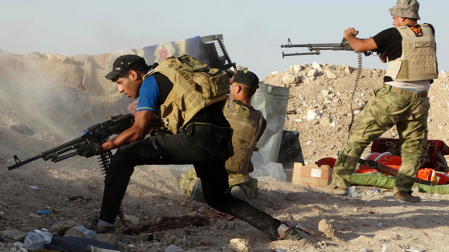 June 15, 2015, Iraqi security forces defend their positions against an Islamic State group attack in Husaybah, 8 kilometers (5 miles) east of Ramadi, Iraq. (AP Photo, File)