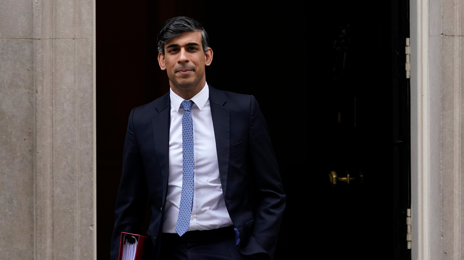 Britain's Prime Minster Rishi Sunak departs 10 Downing Street to go to the House of Commons for his weekly Prime Minister's Questions in London, Wednesday, March 13, 2024. (AP Photo/Alberto Pezzali)