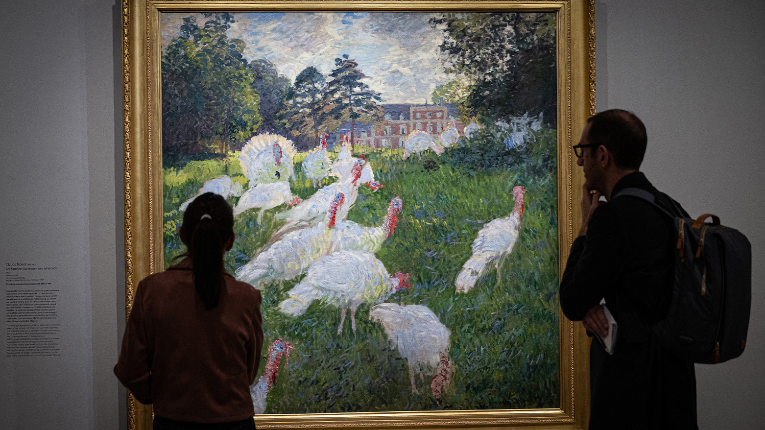 Visitors in front of the painting "Les Dindons" (The Turkeys - 1876) by French impressionist painter Claude Monet (1840-1926), at the Musee d'Orsay in Paris on March 22, 2024. (Photo: MIGUEL MEDINA/AFP)