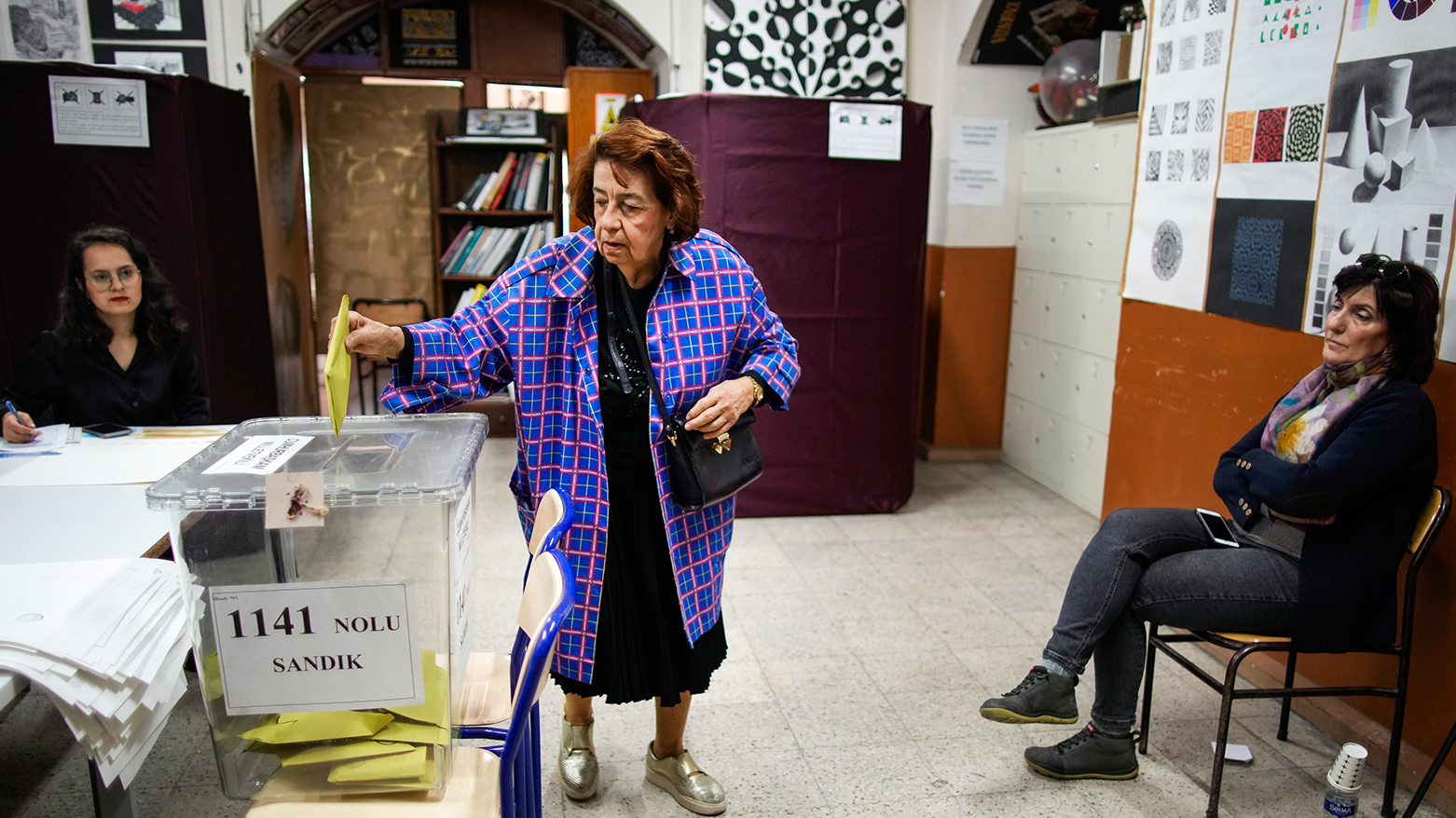 A woman votes at a polling station in Istanbul, Turkey, Sunday, May 14, 2023. (Photo: AP)