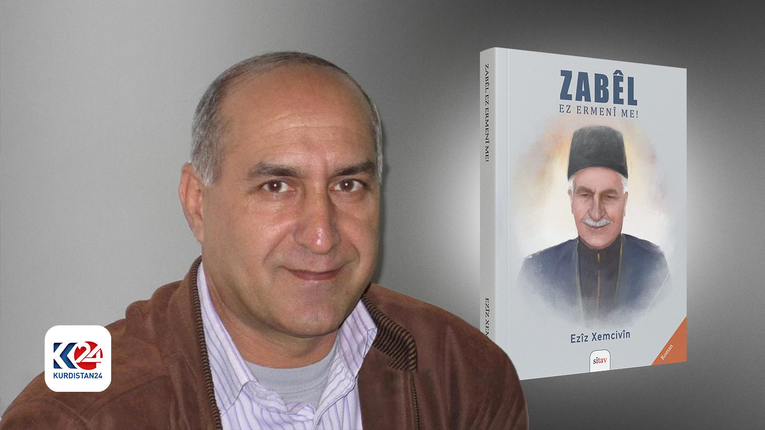 Aziz Khemcivin (Ezîz Xemcivîn) alongside his novel "Zabêl Ez Ermenî Me". (Photo: Kurdistan 24)