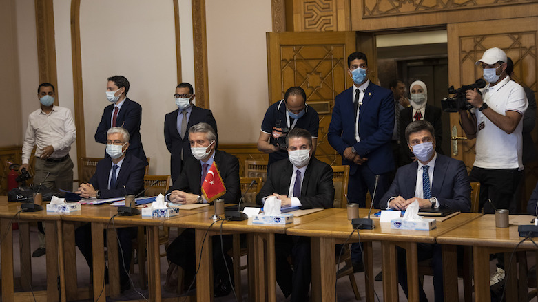 Turkish Foreign Ministry Deputy Sedat Onal, seated second right, meets with Hamdi Sanad Loza, Egyptian deputy foreign minister at the foreign ministry in Cairo, Egypt, May 5, 2021. (Photo: Nariman El-Mofty/AP)