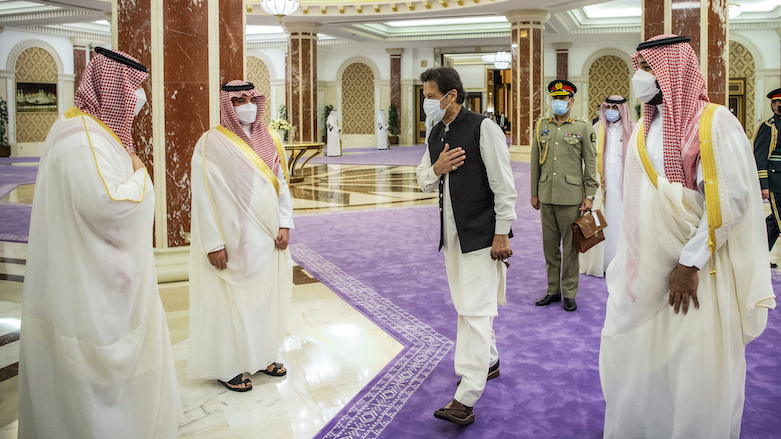A handout picture provided by the Saudi Royal Palace on May 8, 2021, shows Saudi Crown Prince Mohammed bin Salman (R), and Pakistan’s Prime Minister Imran Khan (2-R) in Jeddah. (Photo: Bandar Al-Jaloud/AFP/Saudi Royal Palace)