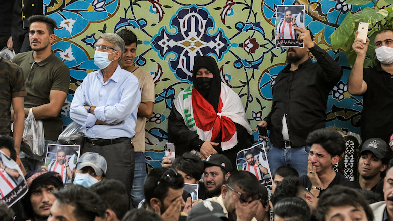 Mourners attend the funeral of assassinated Iraqi anti-government activist Ihab al-Wazni (Ehab al-Ouazni) at the Imam Hussein Shrine in the central holy shrine city of Karbala on May 9, 2021. (Photo: Mohammed Sawaf / AFP)