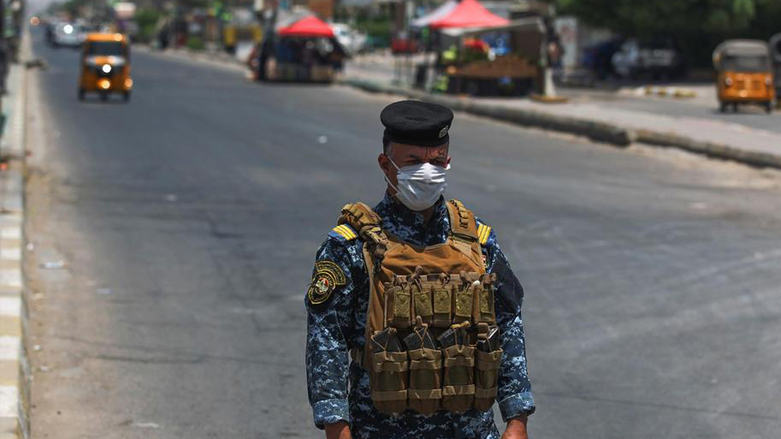 A member of the Iraqi security forces enforce COVID-19 lockdown in Baghdad, May 31, 2020. (Photo: Ahmad al-Rubaye / AFP)