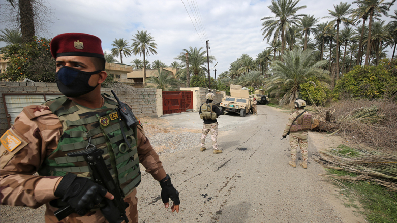 Iraqi forces search an area in Tarmiyah, 35 km (20 miles) north of Baghdad, following clashes with ISIS fighters, Feb. 20, 2021. (Photo: AFP/Ahmad al-Rubaye)