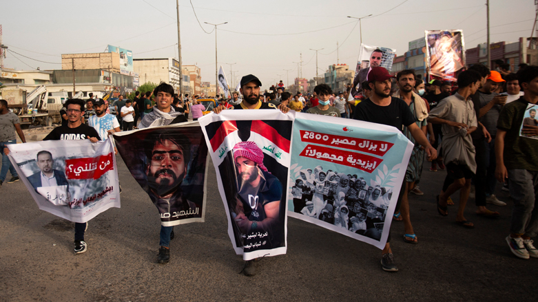 Iraqis demonstrate in the southern city of Basra to demand accountability for a recent wave of killings targeting activists,  May 25, 2021. (Photo: Hussien Faleh / AFP)