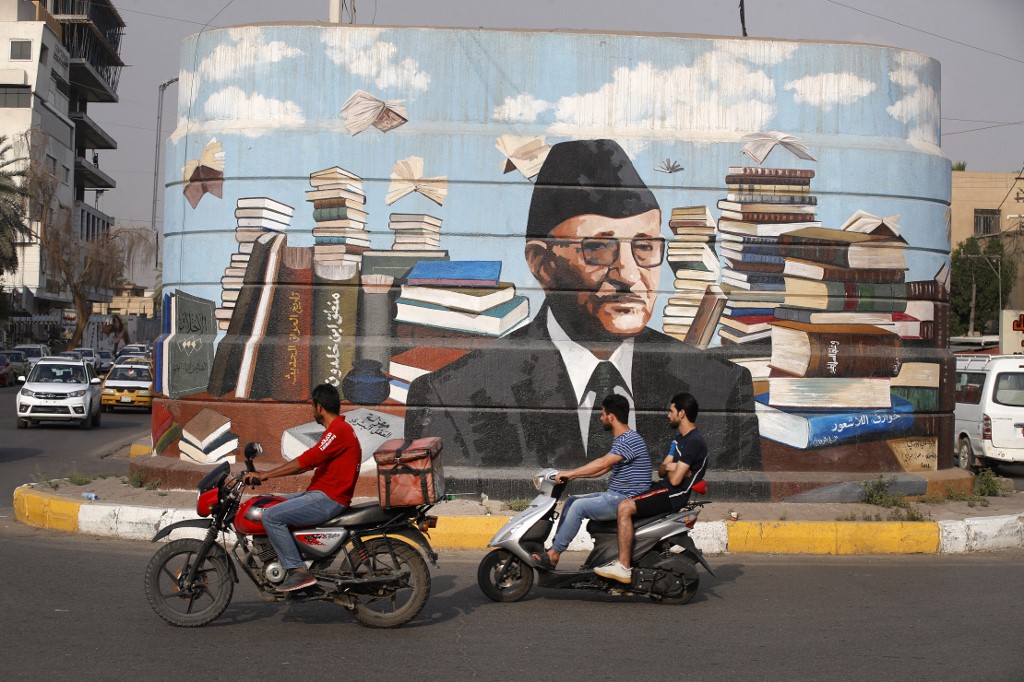  A mural of Iraqi author Ali al-Wardi, drawn by Iraqi painter Wijdan al-Majed, on a concrete structure in the capital Baghdad, April 26, 2022. (Photo: Ahmad Al-Rubaye/AFP)