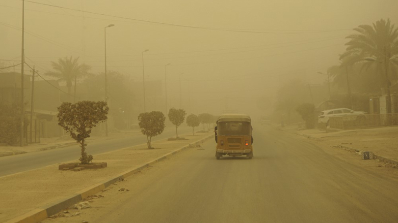 A car driving through another Spring sandstorm in the Iraqi capital Baghdad, May 5, 2022. (Photo: Sabah Arar/AFP)