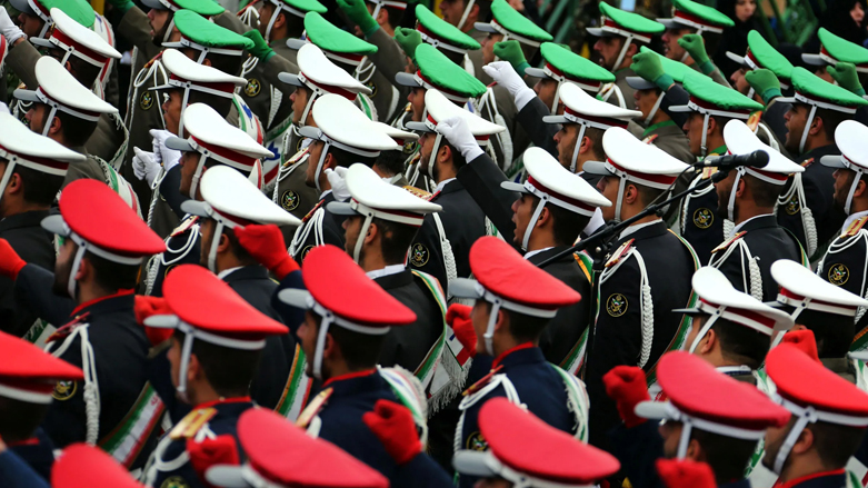 Islamic Revolutionary Guard Corps (IRGC) soldiers march during a military parade. (Photo: Atta Kenare/AFP)