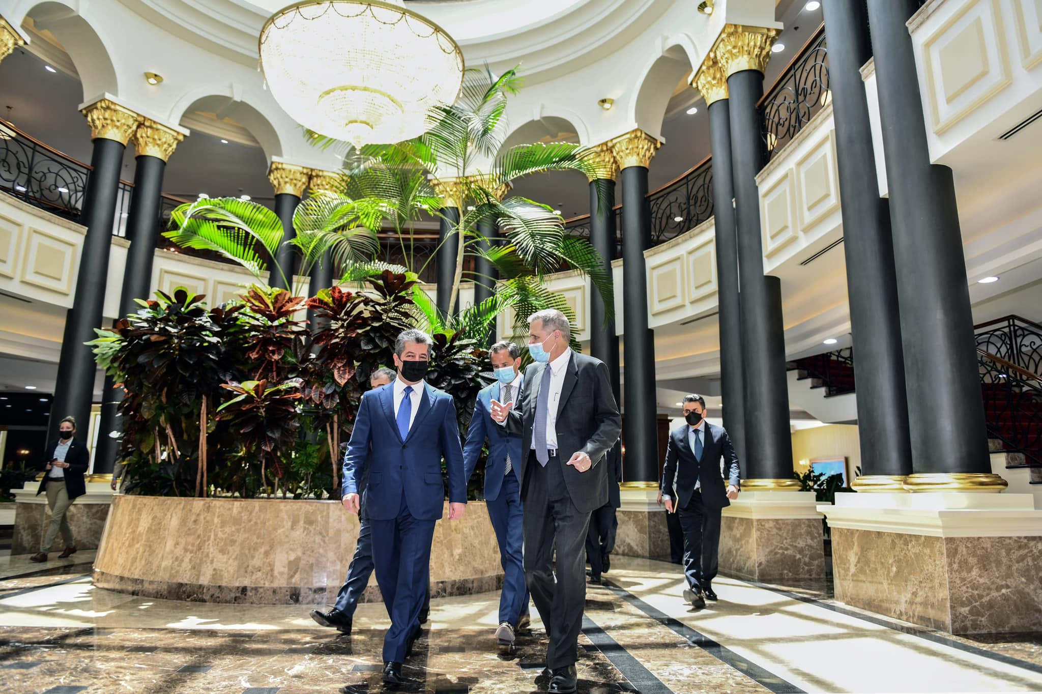 Prime Minister Masrour Barzani (left) walks alongside outgoing US Ambassador to Iraq Matthew Tueller in Erbil, May 16, 2022. (Photo: KRG)