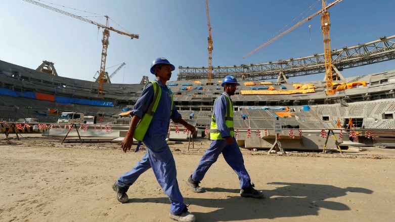 عمال أجانب بملعب لوسيل لكأس العالم لكرة القدم 2022 الدوحة، قطر، 20 ديسمبر 2019. © رويترز/ أرشيف