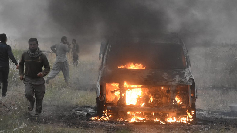 Vehicle on fire following ISIS attack on Kirkuk's Bashir village, May 23, 2022 (Photo: Kurdistan 24)