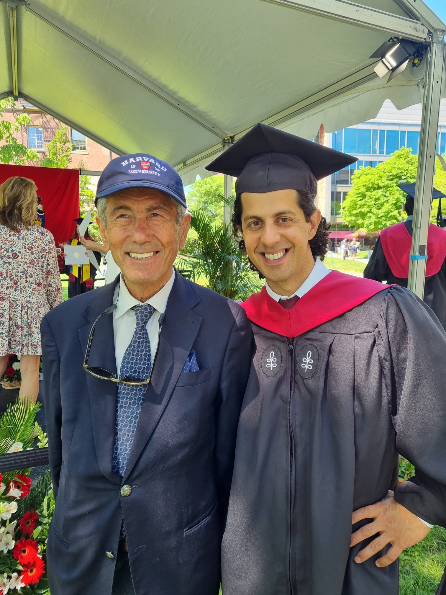 Alan Aqrawi (right) poses for a photo with his father Tariq Kamil Aqrawi at Harvard Yard during his commencement, May 29, 2022. (Photo: Courtesy of Peri-Khan Aqrawi)