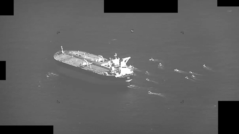 A screenshot of a video showing fast-attack craft from Iran’s Islamic Revolutionary Guard Corps Navy swarming Panama-flagged oil tanker Niovi as it transits the Strait of Hormuz, May 3, 2023. (Photo: U.S. Navy)