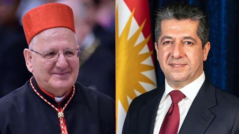 Prime Minister Masrour Barzani (right) and Cardinal Louis Raphaël I Sako, Patriarch of the Chaldean Catholic Church in Iraq and the world. (Photo: Designed by Kurdistan 24)