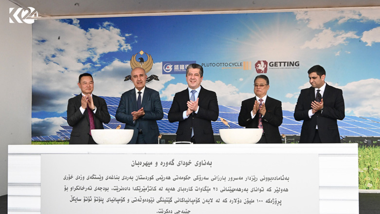Kurdistan Region Prime Minister Masrour Barzani (center) clapping after laying the foundation stone for a $100-million-dollar solar panel project in Erbil, May 18, 2023. (Photo: Islam Hero/Kurdistan 24)