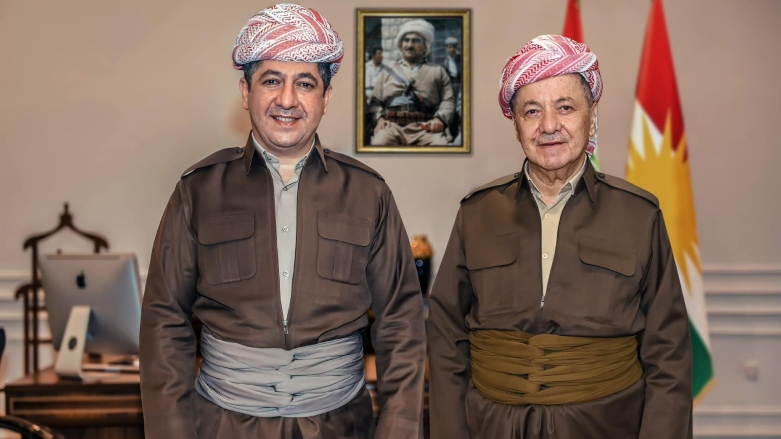 Kurdistan Region Prime Minister Masrour Barzani (left) posing for a picture beside KDP President Masoud Barzani. (Photo: KDP)
