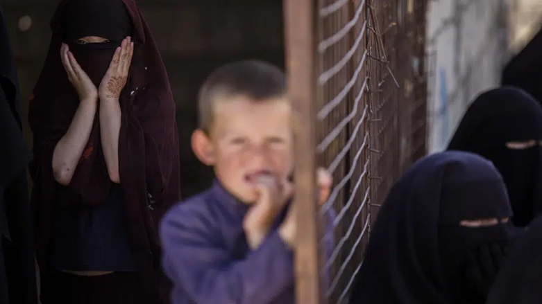 Children stand in al-Hol camp, which houses families of members of the Islamic State group in Hasakeh province, Syria, Wednesday, April 19, 2023. (Photo: AP Photo/Baderkhan Ahmad)