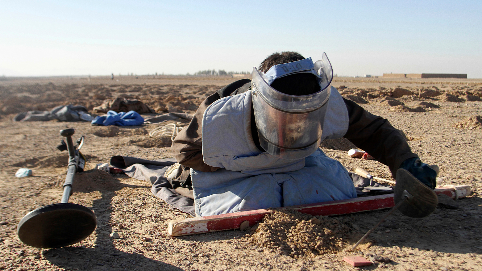 A de-miner searches for land mines. (Photo: AP)