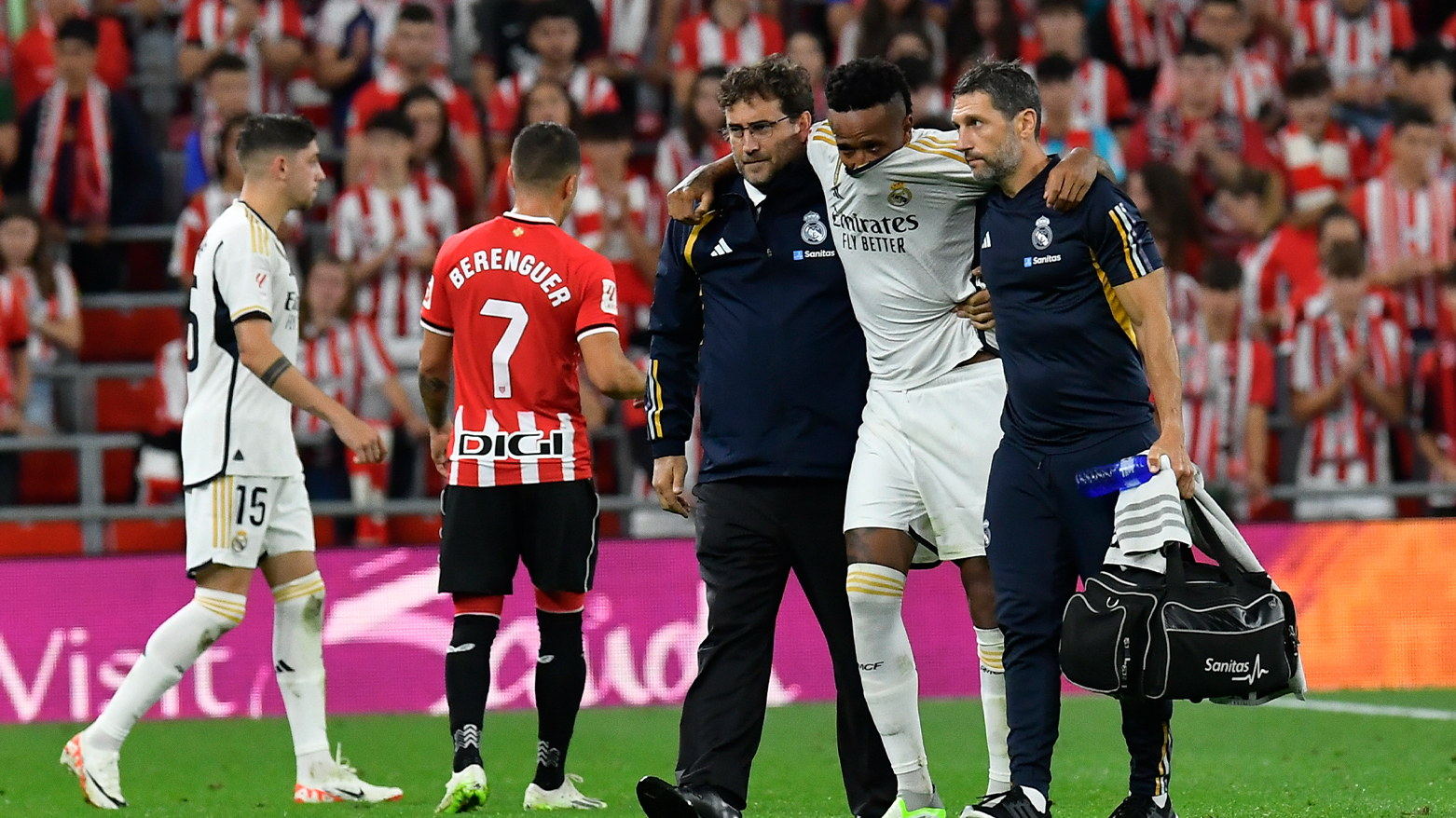 Real Madrid's Eder Militao leaves the pitch after an injury. (Photo: AP)