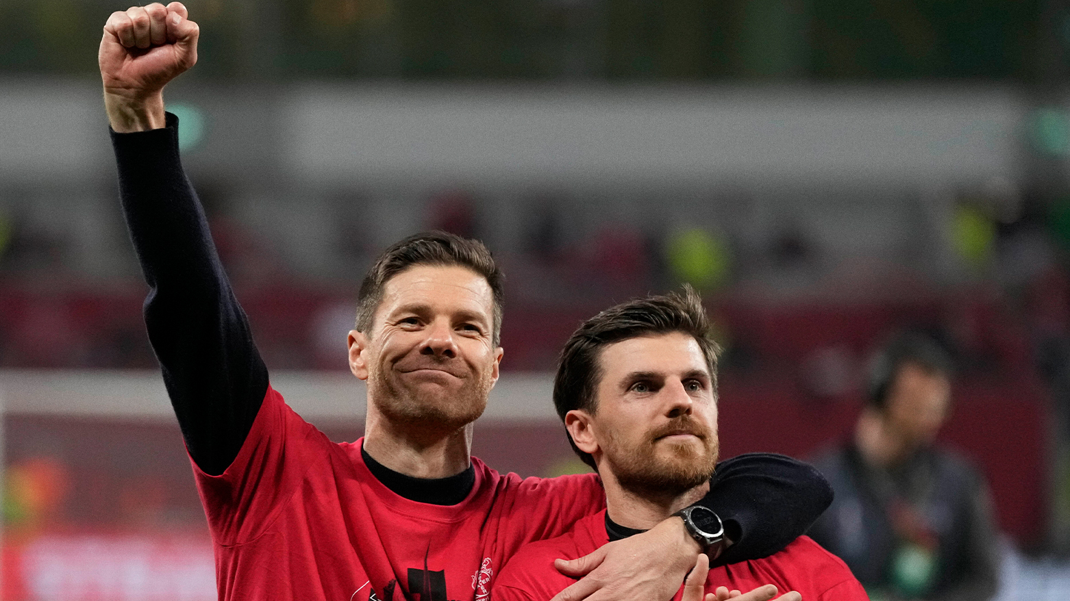 Leverkusen's head coach Xabi Alonso, left, celebrates at the end of the Europa League second leg semi-final. (Photo: AP)