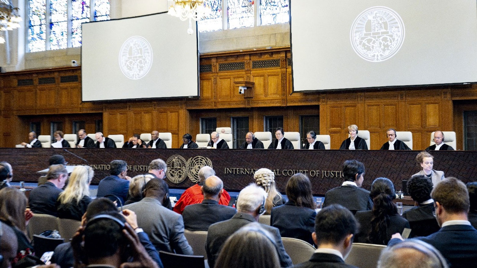 ICJ judges (top) attend a hearing of the International Court of Justice (ICJ). (Photo: AFP)