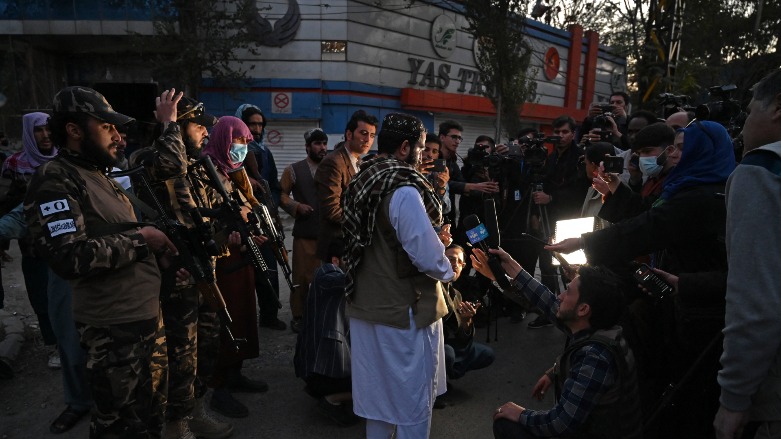 A Taliban official (C) addresses journalists near the Sardar Mohammad Dawood Khan military hospital in Kabul on November 2, 2021, after at least 19 people were killed and 50 others wounded in an attack on a military hospital. (Photo: Wakil 