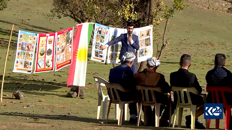 A volunteer talks about various kinds of landmines at a village in the Kurdistan Region's Bradost district, Nov. 11, 2021. (Photo: Kurdistan 24)