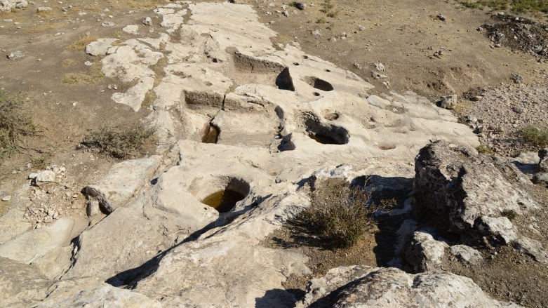 A The site of a 2,700-year-old winery discovered by archaeologists in the Kurdistan Region's Duhok province, Oct. 28, 2021. (Photo: Ari Jalal/Reuters)
