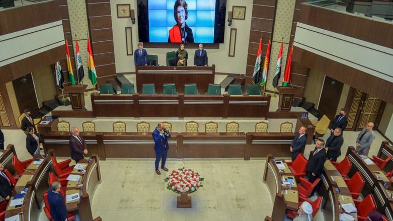 Members of Kurdistan Parliament observe a minute of silence to commemorate the 10th anniversary of the passing of Danielle Mitterrand, known as "Mother of the Kurds", Nov. 23, 2021. (Photo: Kurdistan Parliament)