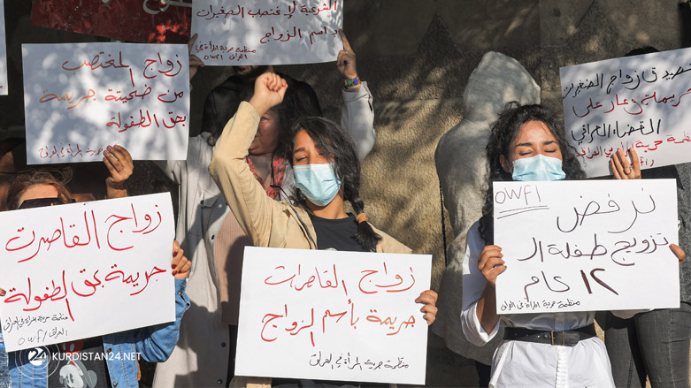 Women rights activists outside Baghdad's Kadhimiya court protesting against the legalization of 12-years-old Esra'a's marriage, Nov. 21, 2021. (Photo: Ahmad al-Rubaye/AFP)