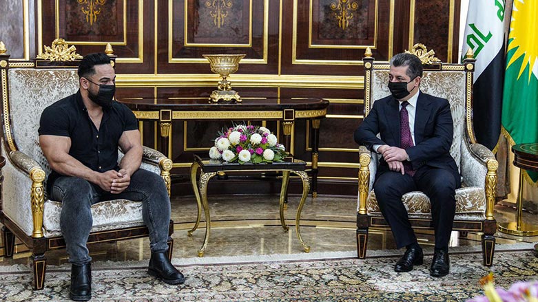 Prime Minister Masrour Barzani (Right) meets with bodybuilding champion Haji Rikani in Erbil, Nov. 25, 2021. (Photo: KRG)