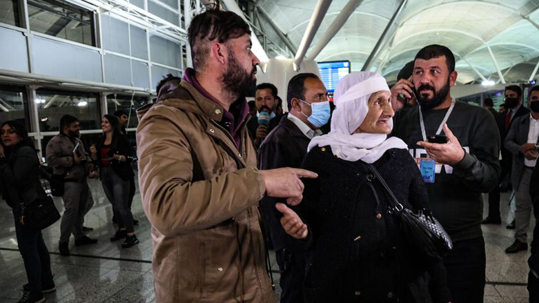 Migrants flown home from the Belarusian capital Minsk arrive at Erbil International Airport. (Photo: Safin Hamed/AFP)