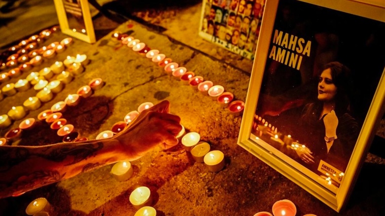 Iranians in Greece lit candles to commemorate the death of Iranian Kurdish woman Mahsa Amini, 22, in this file photo from October 29, 2022 (Photo: Louisa GOULIAMAKI AFP/File)