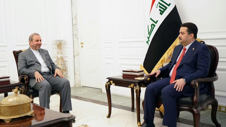 السوداني خلال لقائه السفير الإيراني لدى العراق