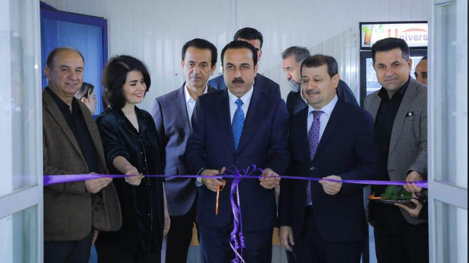 Erbil Governor Omed Khoshnaw (C) and artist Arazu Yazdanifar (2L) arrive at the exhibition, Nov. 6, 2023. (Photo: Erbil Governorate/ Facebook)