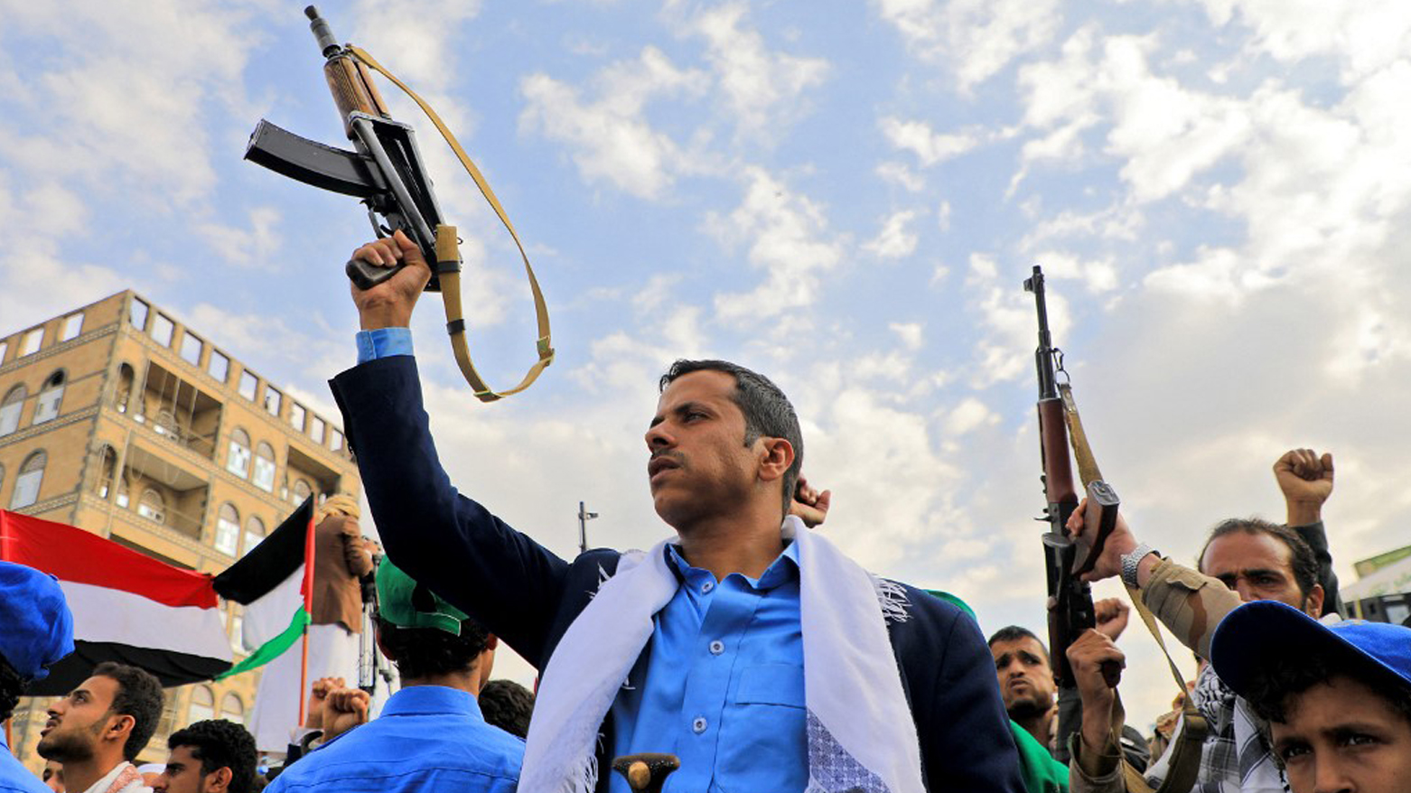 Yemenis brandish rifles and wave Palestinian flags during a march in solidarity with the people of Gaza, Nov. 10, 2023. (Photo: Mohammed Huwais/AFP)