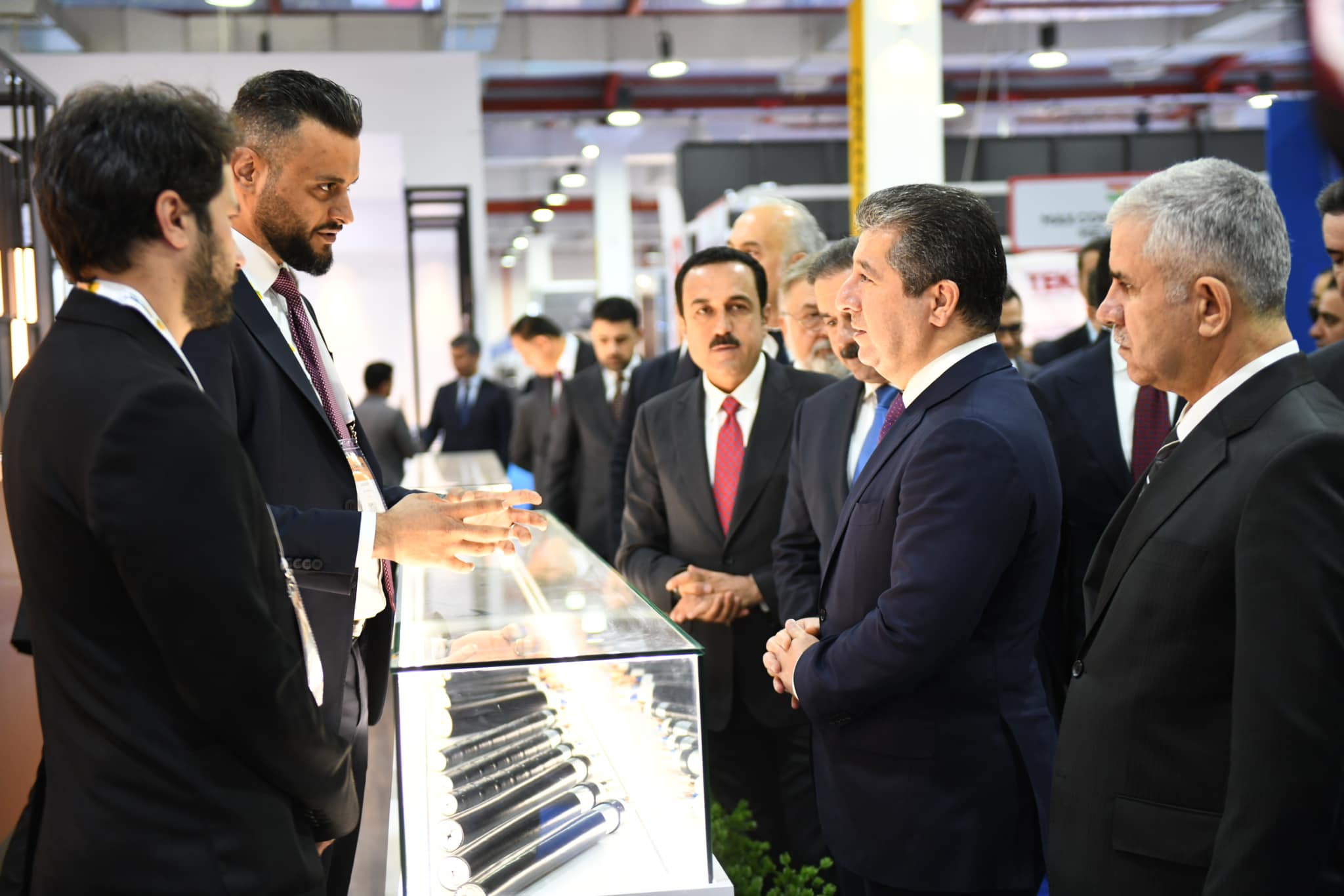 Kurdistan Region Prime Minister Masrour Barzani (second from right) reviewing product samples at Construct Iraq 2023, Nov. 14, 2023. (Photo: KRG)