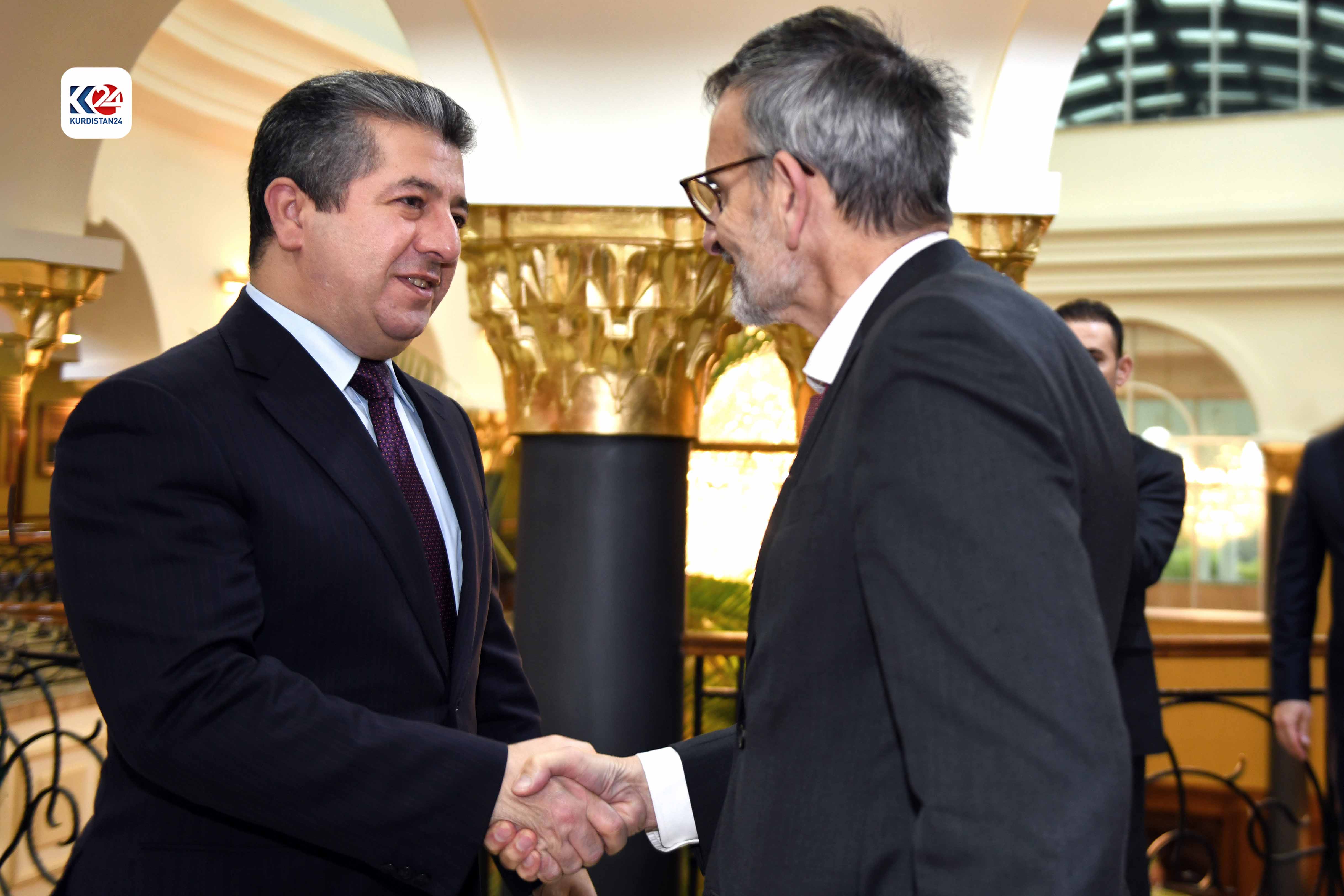 Kurdistan Region Prime Minister Masrour Barzani (right) shaking hands with Volker Perthes, Head of the Independent Strategic Review of the UNAMI, Nov. 15, 2023. (Photo: KRG)
