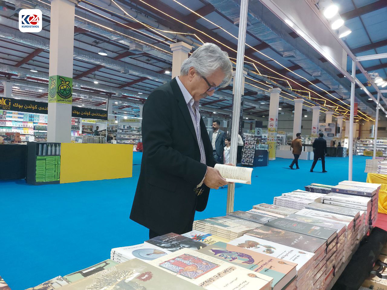 Hiwa Qadir, a Kurdish author whose 28 books are presented at the 5th International Sulaimani Book Fair, Nov. 23, 2023. (Photo: Kurdistan 24)