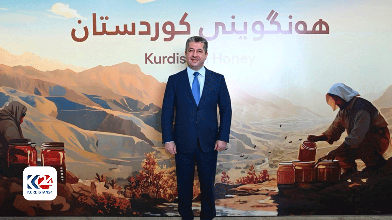 Prime Minister Masrour Barzani poses for a photo at a meeting of the Beekeepers Network Association of Kurdistan. (Photo: KRG)
