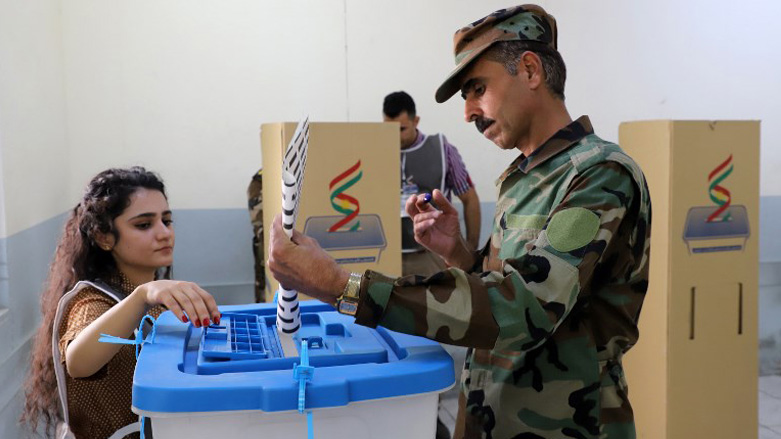 A member of the Kurdish Peshmerga forces casts his vote at a polling station in Sulaimani on the morning of Sep. 28, 2018. (Photo: AFP/Shwan Mohammed)