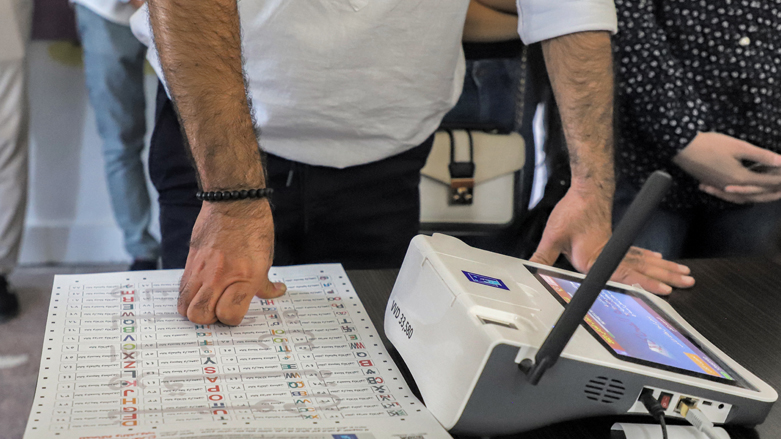 Officials of Iraq's electoral commission undergo a polling day simulation to test run its systems ahead of the upcoming parliamentary elections, in Baghdad, on Sept. 22, 2021. (Photo: Ahmad al-Rubaye/AFP)