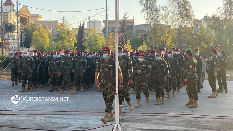 Members of Zeravani forces are pictured awaiting the opening of voting centers in the Kurdistan Region's capital Erbil, Oct. 8, 2021. (Photo: Renas A. Saeed / Kurdistan 24)