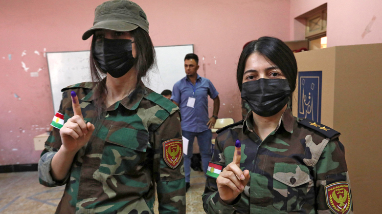 Female members of Kurdish Peshmerga security forces cast their votes for the parliamentary elections in the Kurdistan Region's Erbil, Oct. 8, 2021. (Photo: Safin Hamed/AFP)
