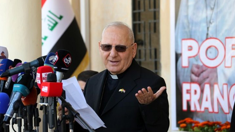 Cardinal Louis Raphael I Sako speaks at a press conference in Erbil.