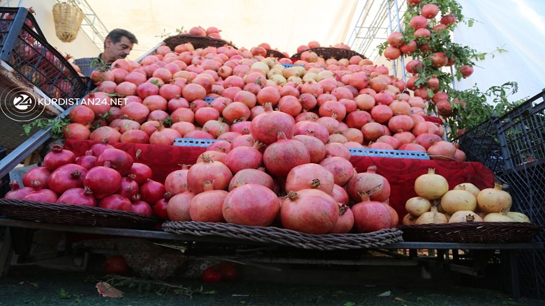 Pomegranates are displayed at a booth in Halabja's seventh autumn festival, Oct. 14, 2021. (Photo: Dana Hama Gharib/Kurdistan24)